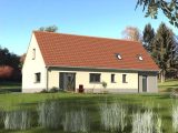 Belle maison au toit rouge, 147m², garage accolé, lucarne  Maisons Les Naturelles